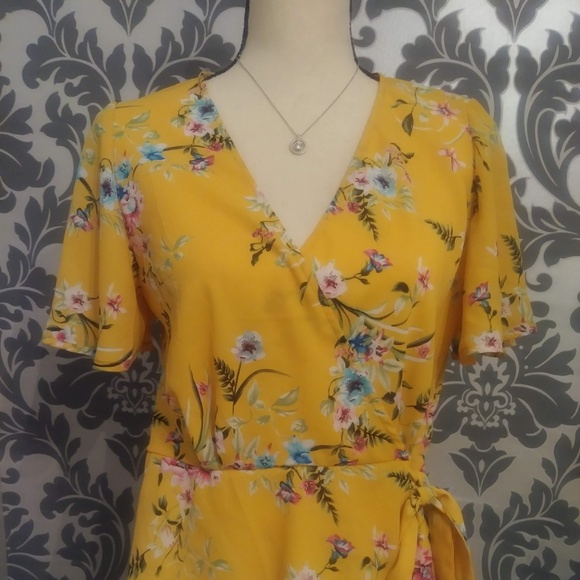yellow floral wrap top